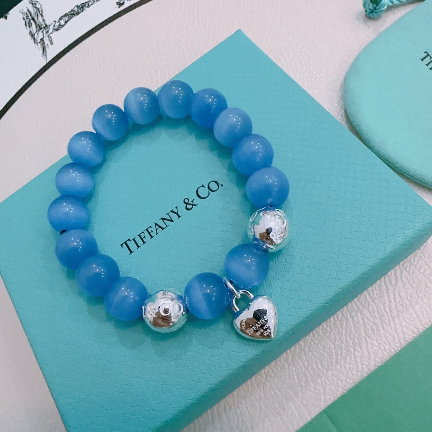 Tiffany & Co. Blue Beaded Bracelet with Lock Charm